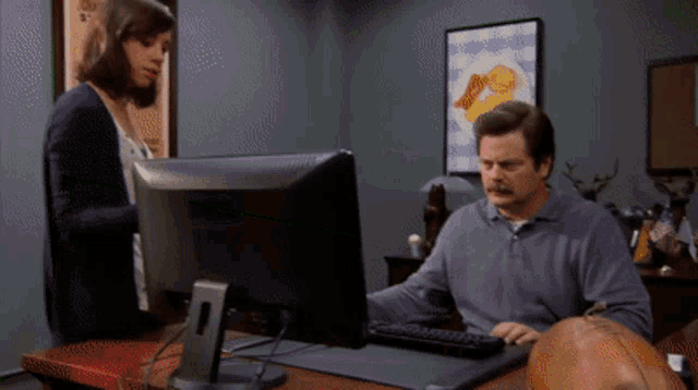 ron-swanson-throws-out-his-computer.gif