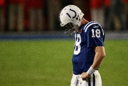 peyton-manning-file-head-down-saint.jpg