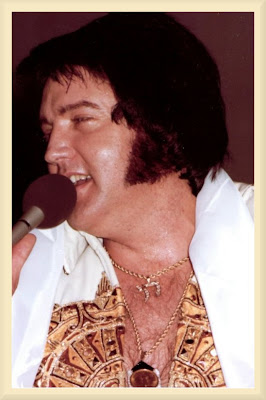 elvisfatheadshot.jpg